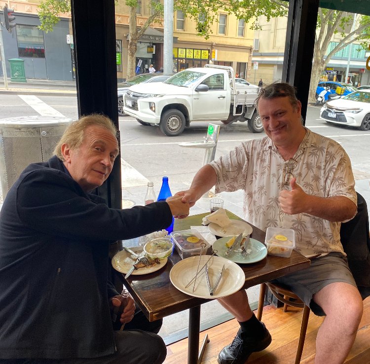 Frank Howson in conversation at an event